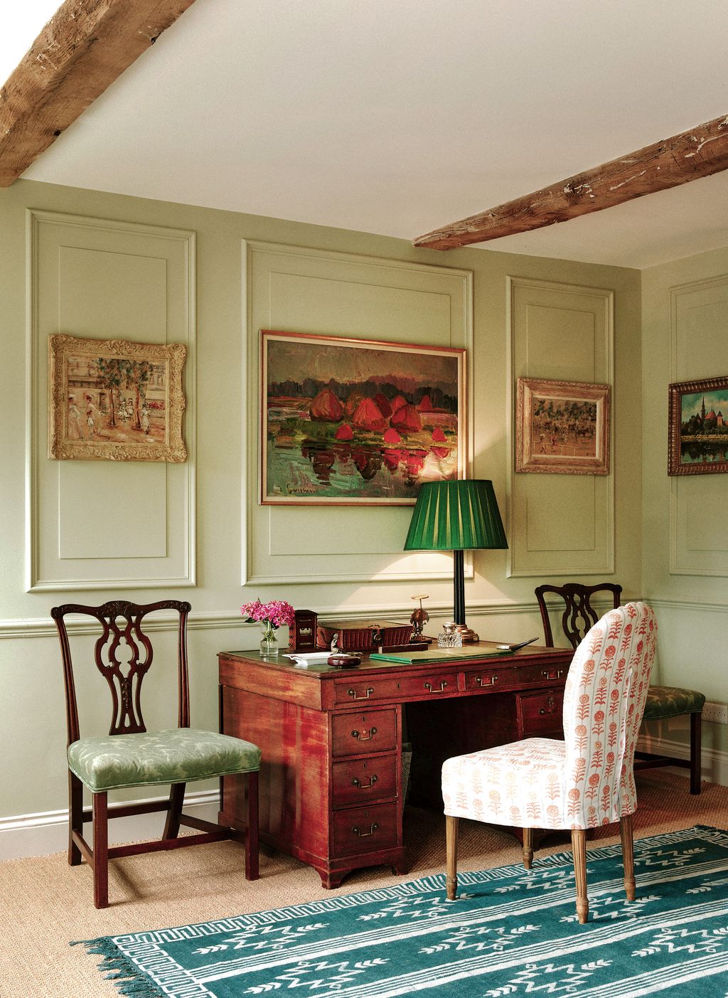 Image may contain Home Decor Corner Indoors Interior Design Furniture Table Lamp Chair Table Lamp Art and Painting