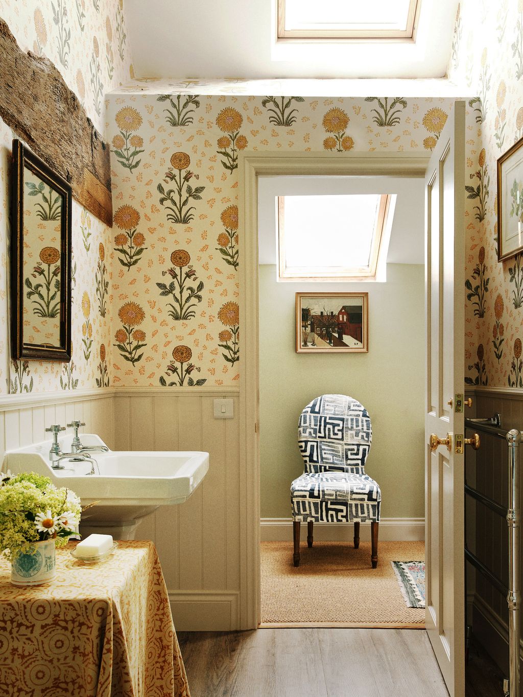 Image may contain Corner Chair Furniture Home Decor Indoors Interior Design Sink Sink Faucet and Rug